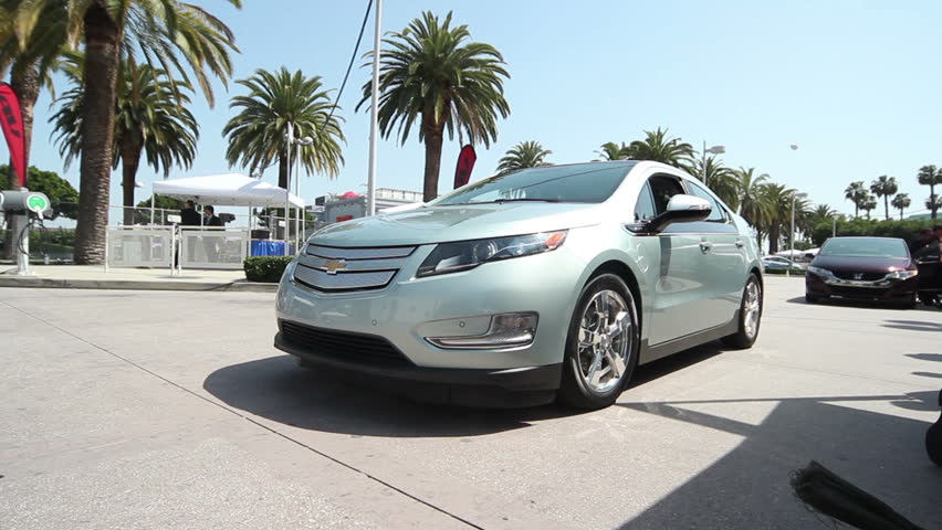 LOS ANGELES - MAY 6: A test driver starts a Chevy Volt at the 26th Electric Vehicle Symposium on May 6, 2012 in Los Angeles, California. The event proved popular as a variety of models were available to drive.