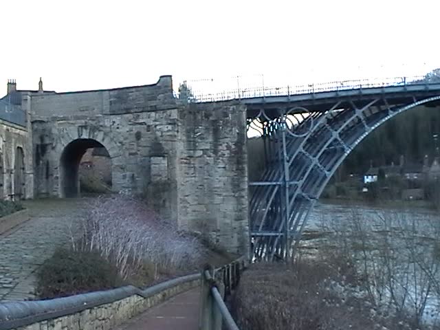 The Iron Bridge crosses the River Severn at the Ironbridge Gorge, by the village of Ironbridge, in Shropshire, England. It was the first bridge in the world to be made out of cast iron