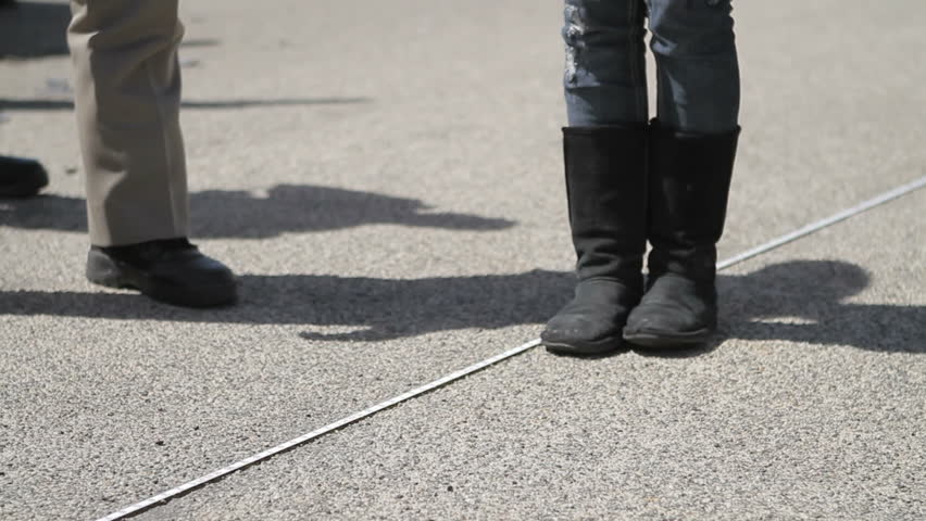 Female being administered a Field Sobriety Test 