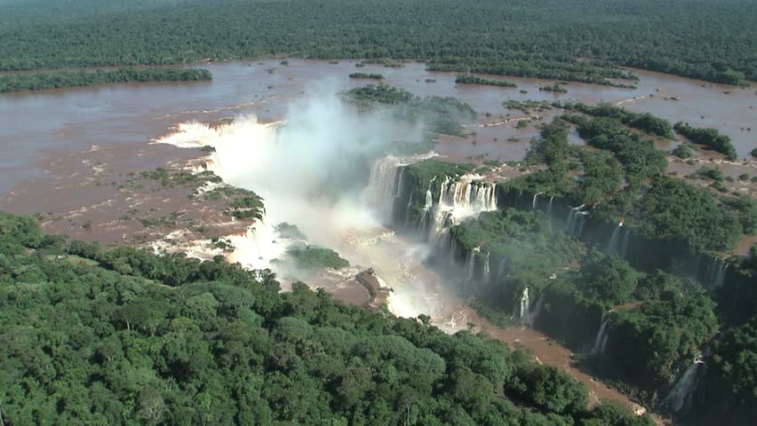 aerial view of Iguazu Falls on Argentina/Brazil border as helicopter starts to move in to main fall, Garganta del Diablo