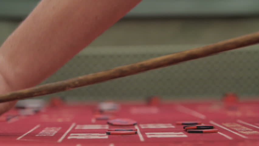 Gamblers placing their bets at the crap table