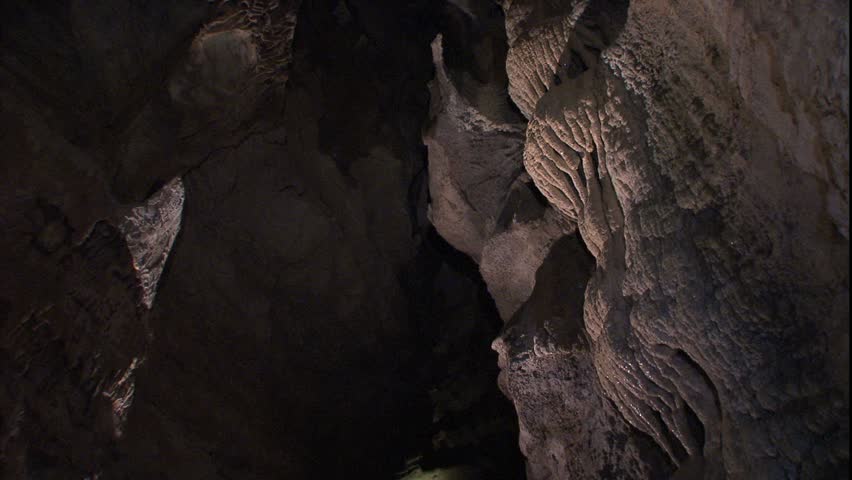 Cave passage and dripping stalactites