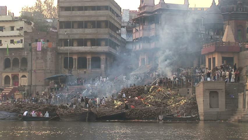 Burning ghat on Ganges with funeral pyres.Circa November, 2008, Veranasi, India