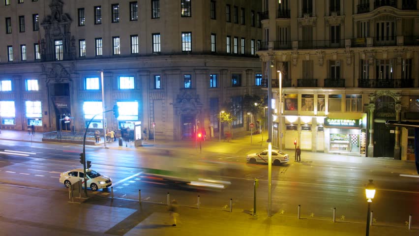 MADRID - MAR 11: (Timelapse View) Taxi stands on Gran Via Street in evening, on Mar 11, 2012 in Madrid, Spain