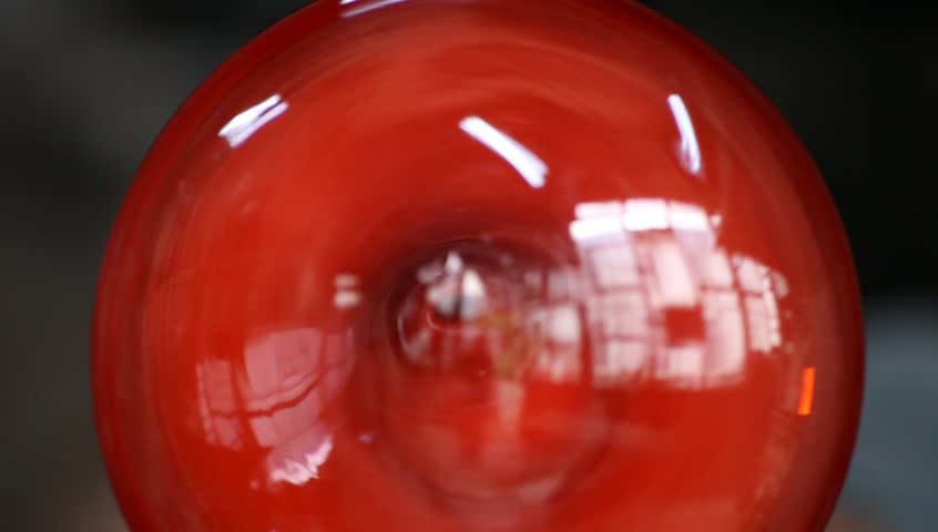 Glass workshop. Studio glass sculpture making. Atelier. Camera raw footage.