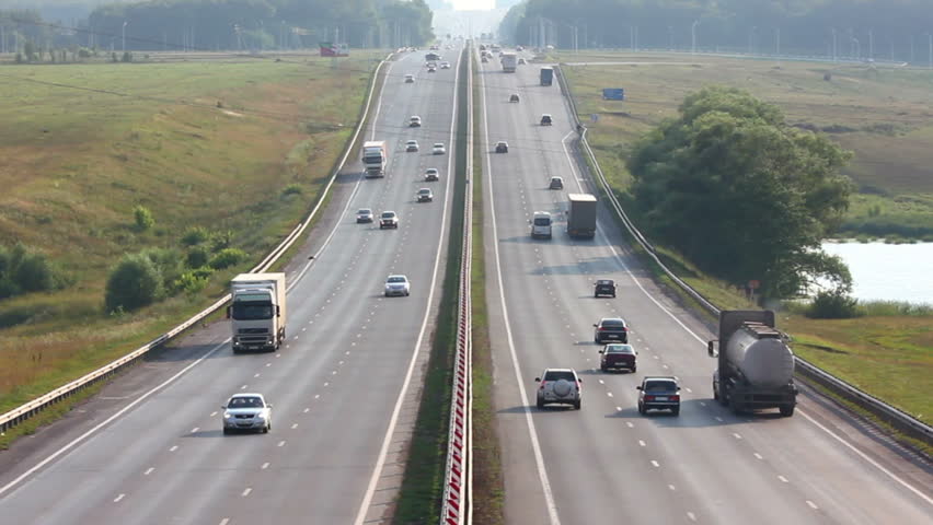 cars traveling on highway