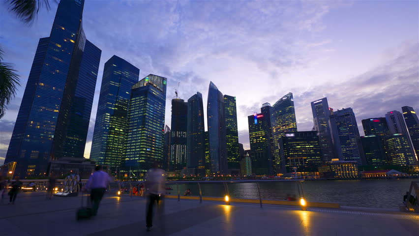 SINGAPORE - MAY 8: (Timelapse in motion view) Sunset at Marina bay quay in the centre of Singapore on May 8, 2012.