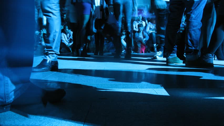 MOSCOW - APR 8: (Timelapse View) Feet of visitors move in front of sitting photographers on VOLVO - Week of fashion in Moscow in Gostini dvor, on April 8, 2012 in Moscow, Russia