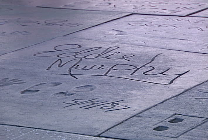 LOS ANGELES - Circa 2002:Eddie Murphy & Star wars handprints in front of Grauman's Chinese Theatre on the Hollywood Walk of Fame in Los Angeles, CA in 2003