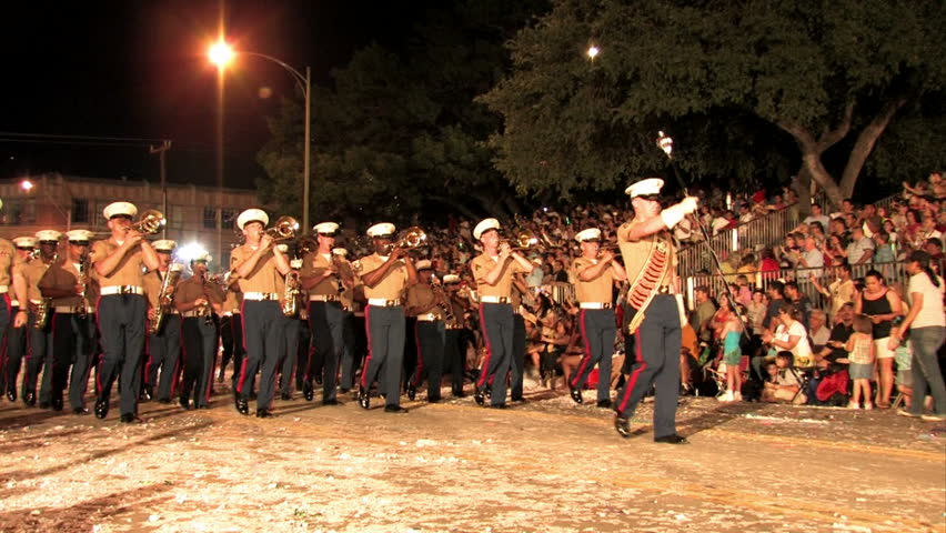SAN ANTONIO TEXAS CIRCA 2008: Annual Fiesta night Flambeau parade brings economic boom to south Texas. US Marine Corp marching band patriots and recruitment for the Armed Forces of the USA. Proud.