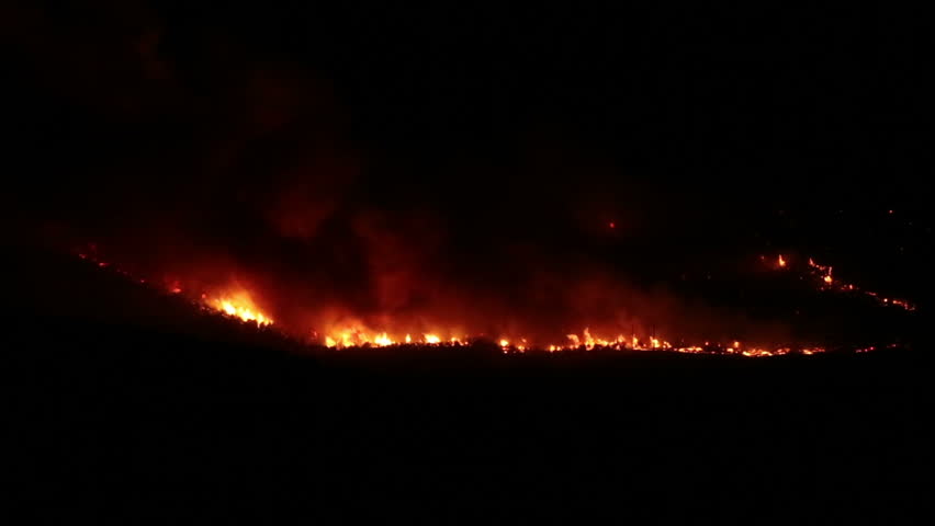 FOUNTAIN GREEN, UTAH - JUN 23: The Sanpete forest fire burns out of control during the night in Wood Hollow Canyon on June 23, 2012 in Fountain Green, Utah. The fire had burned over 6,000 acres and caused more than 500 homes to be evacuated as of June 25.
