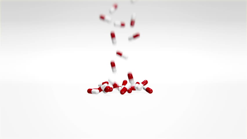 3D animation of red and white pills falling into scene. 