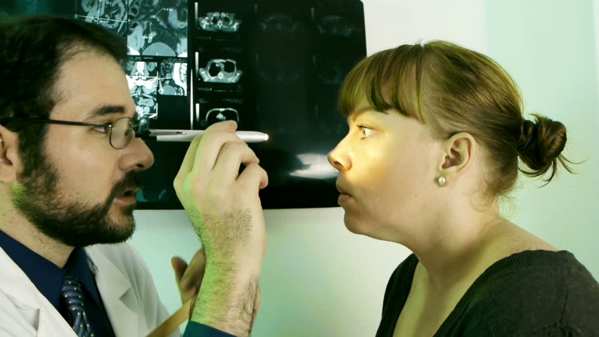 Doctor Checking Eyes (HD)  routine eye and vision checkup on a woman. Take changes into eyes view. 
