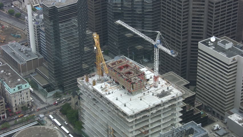 Timelapse shot of construction cranes. Downtown Toronto.