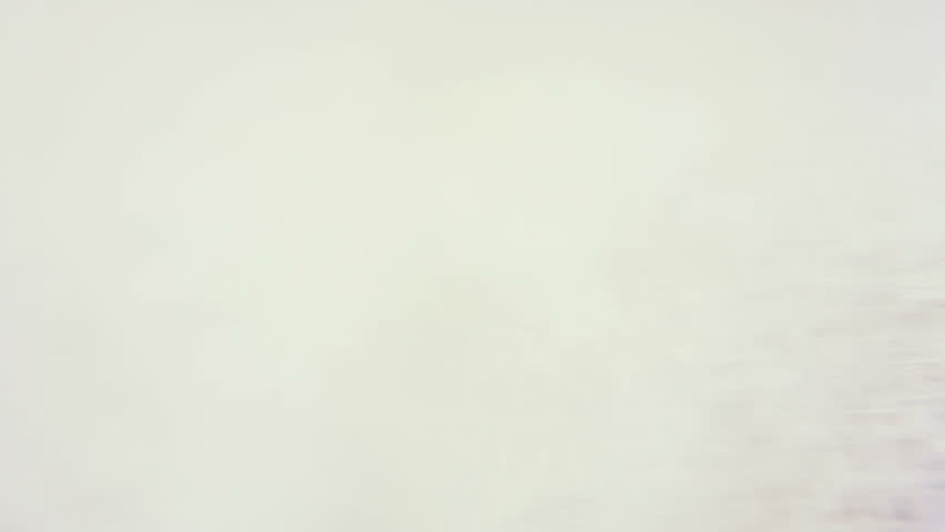 Macro clip of liquid, bubbles and froth. Abstract video that could be used as effect, transition or background and even as a conceptual video.

