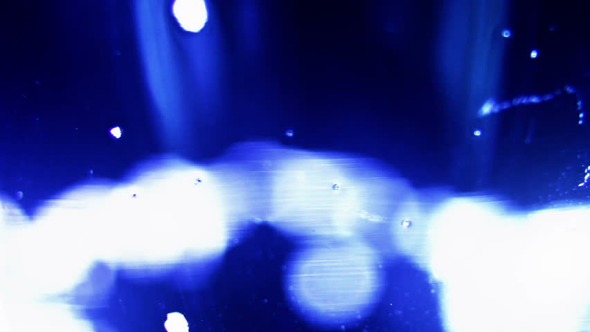 Macro clip of liquid, bubbles and froth. Abstract video that could be used as effect, transition or background and even as a conceptual video.
