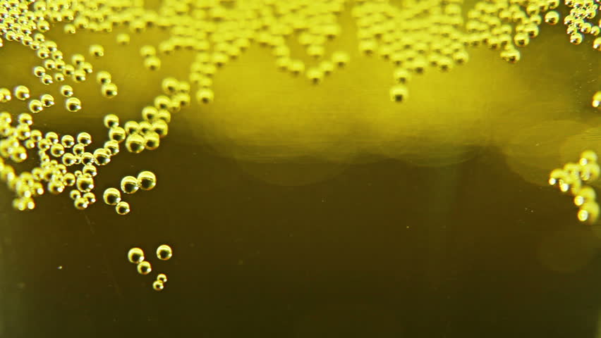 Macro clip of liquid, bubbles and froth. Abstract video that could be used as effect, transition or background and even as a conceptual video.