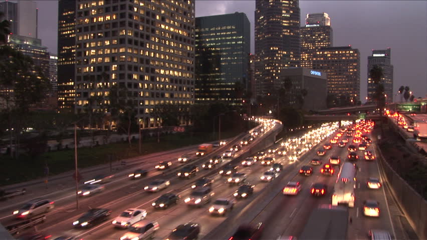 Los Angeles, CA - CIRCA February 2006: The many colors of the freeway at night can be hypnotic to watch but the drivers trying to get home have a hard time seeing the beauty in being stuck in traffic