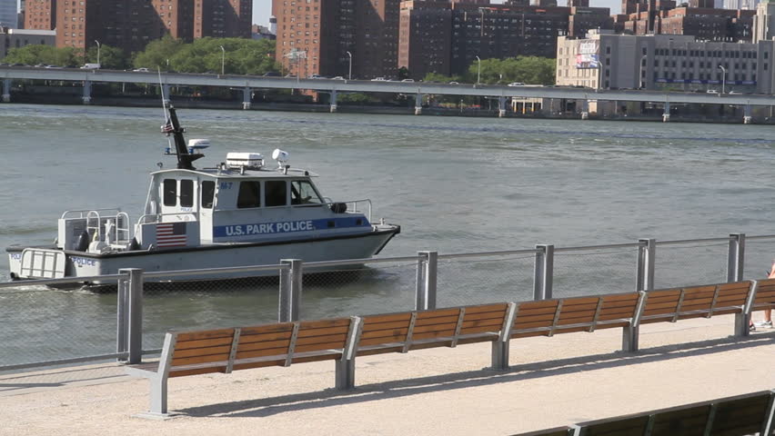 BROOKLYN, NEW YORK - MAY 1, 2012: A New York Police Dept boat prevents crime and terrorism by patrolling East River