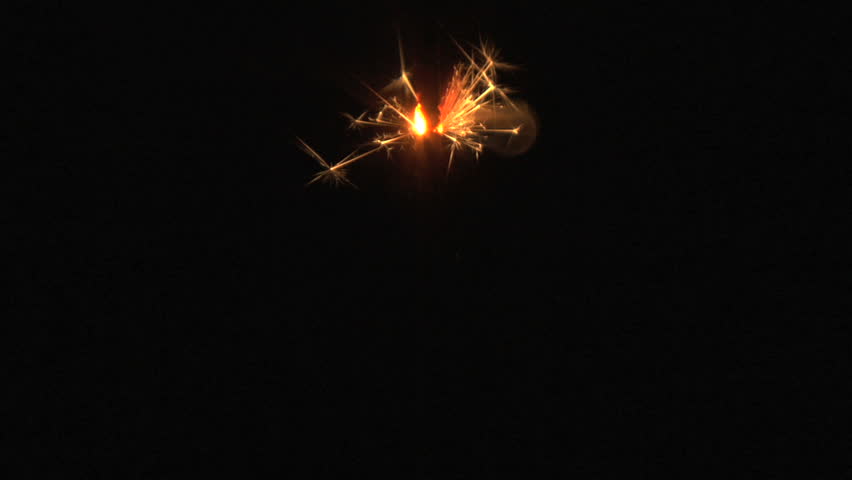 yellow sparkler on black