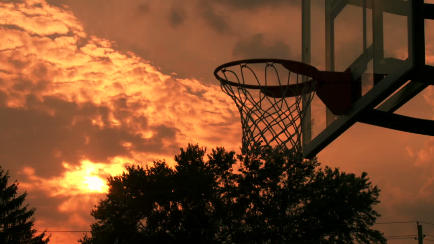 Time Lapse Of Clouds Growing And Moving Across The Sky Above Basketball