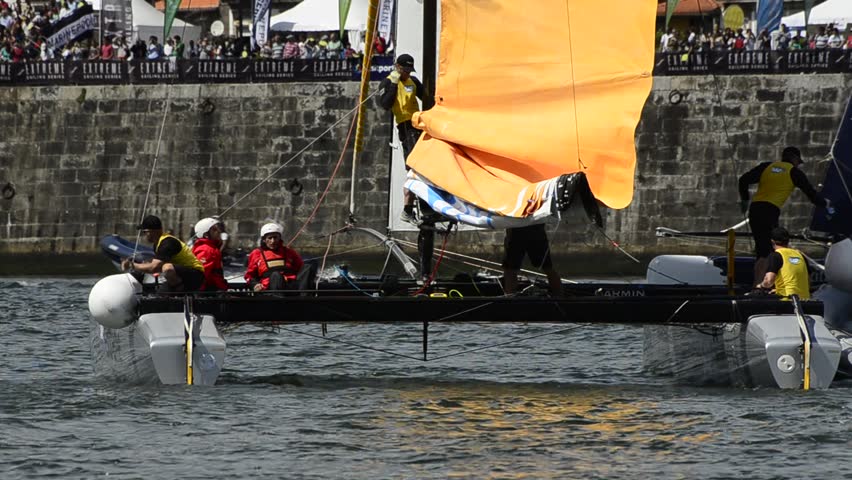 PORTO, PORTUGAL - JULY 07: SAP Extreme Sailing Team compete in the Extreme Sailing Series boat race on july 07, 2012 in Porto, Portugal.