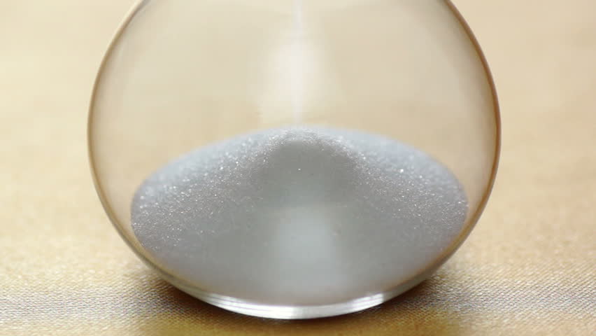 Sand hourglass measuring the passage of time
