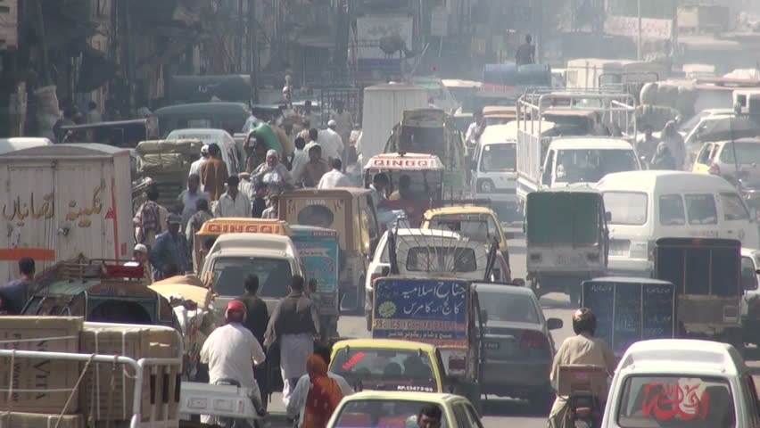 RAWALPINDI - 17 OCTOBER 2010: Cars, rickshaws, lorries, and other traffic are stuck in the narrow streets around the bazaar of Rawalpindi, Pakistan