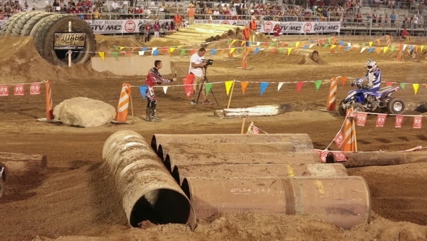 NEPHI, JUAB, UTAH 30 JUN 2012: Economic boost to rural community in annual race.  Four wheel ATV obstacle trouble. Juab County extreme enduro. Difficult obstacle course with jumps, logs and rocks.