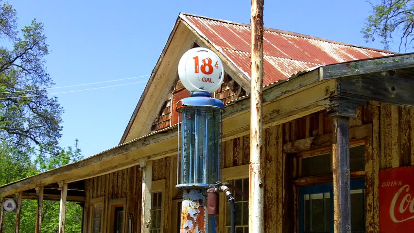 SHEEP RANCH, CA - CIRCA 2012: An historic gas pump from the early automotive age (1920-1930s) advertises gas at 18 cents per gallon circa 2012 in Sheep Ranch, CA.