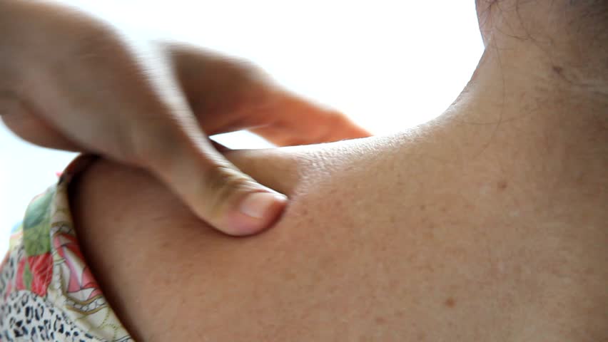 Bee is stinging old woman for treatment