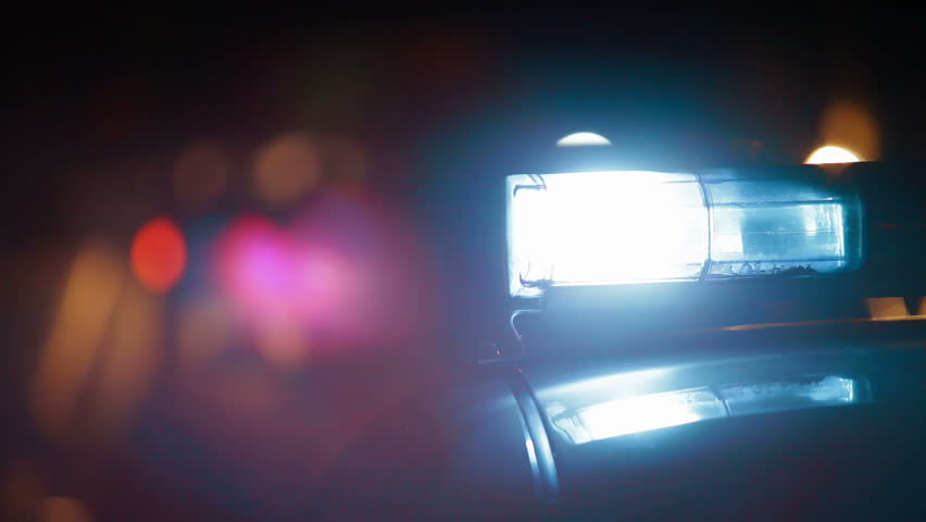 Police Car on Night City Road