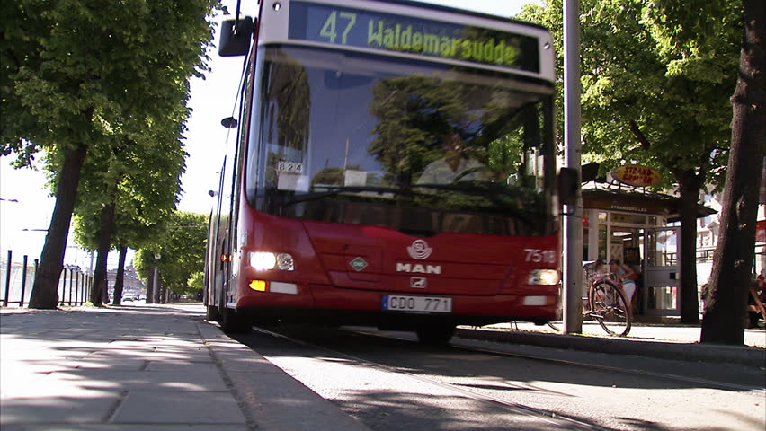 STOCKHOLM, SWEDEN - NOVEMBER 2009: A bus arriving at Strandvagen Boulevard in Stockholm, Sweden.