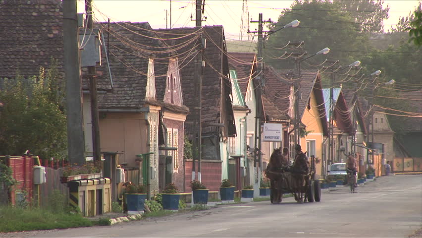 Romania - CIRCA July, 2006: A quiet street in a small town during dusk