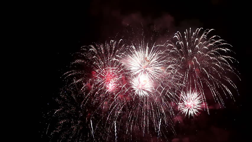 Collage of colorful fireworks exploding in the night sky