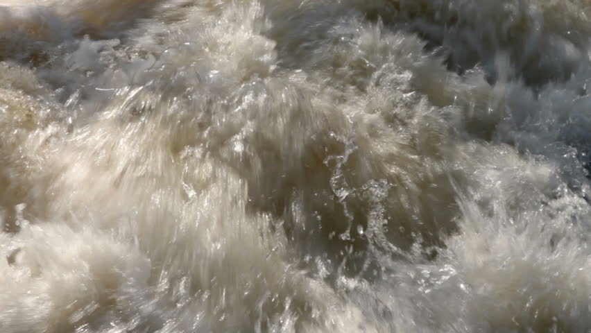 Fast flowing river water creates turbulence