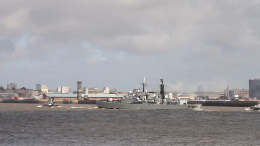 LIVERPOOL, MERSEYSIDE/ENGLAND - MARCH 5: HMS Liverpool sails up the River Mersey for decommissioning on March 5, 2012 in Liverpool. 