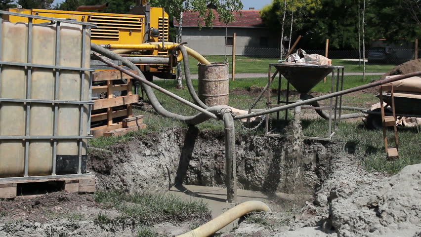 Industrial drain pipe discharging water into a drainage canal. HD1080p. 