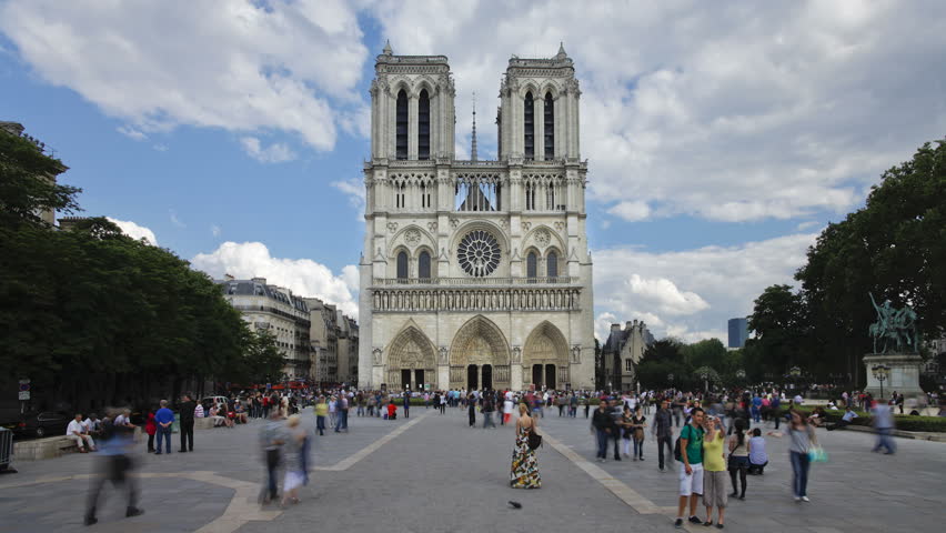 PARIS, FRANCE - CIRCA MAY 2011: Notre Dame Cathedral a famous Landmark in the center of Paris with many tourists visiting