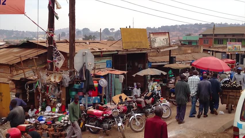 UGANDA, AFRICA - CIRCA JUNE 2012 - Tribal warfare and drought forces many villagers into the crowded streets of the capital city of Uganda on June 12, 2012 in Kampala.