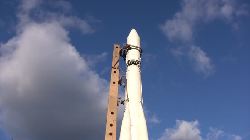 A sky timelapse of a rocket on a launch pad