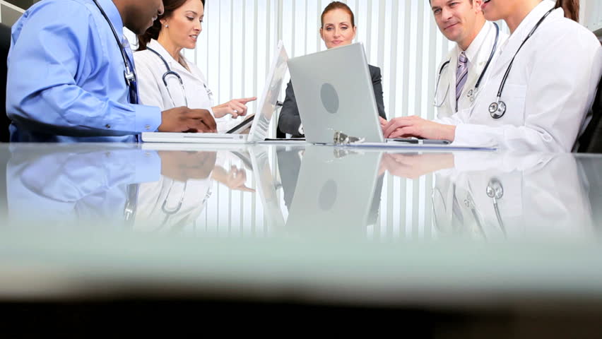 Hospital budgets committee meeting multi ethnic consultants financial advisor