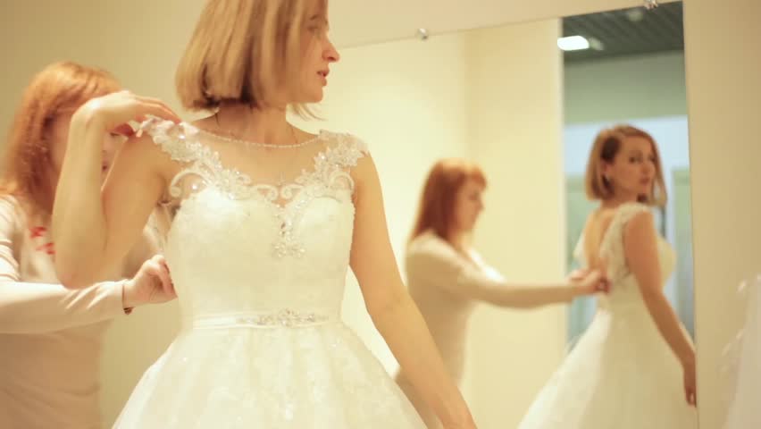 Elegant Bride Trying On Wedding Dress In Bridal Boutique Long Shot Stock Footage Video 2818378 3272