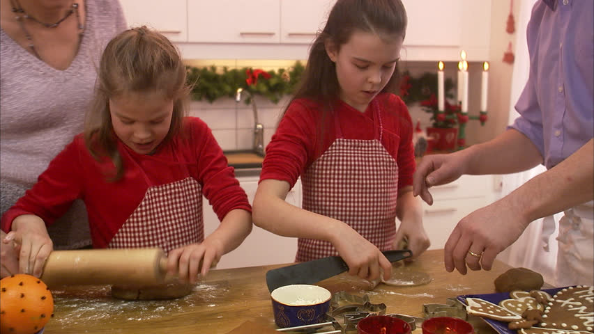 A family making gingerbread biscuits