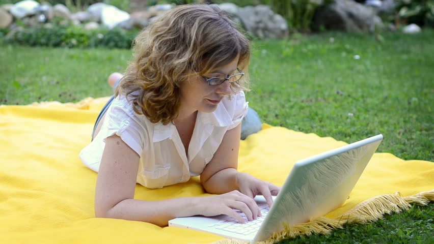 girl lies on a meadow