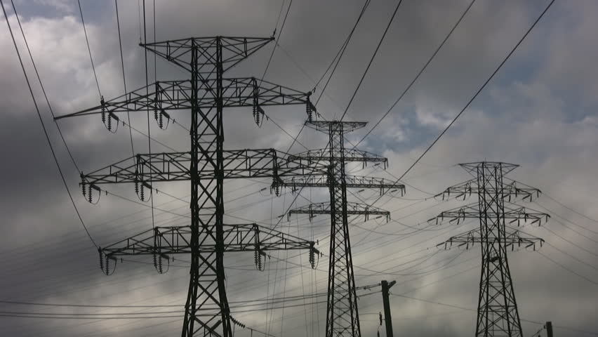 Electrical pylons with timelapse clouds. Clean - no birds! w/fixed tripod.