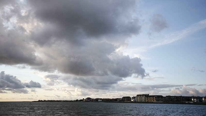 Time lapse of clouds passing over West Kirby Marine Lake at sunset