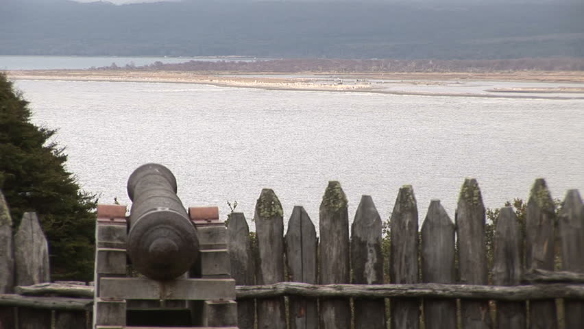 Cannon and a wooden fence at Bulnes fortress in Punta Arenas, Chile