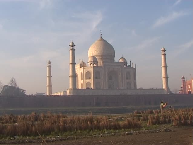 Farmer with mattock with Taj Mahal background
