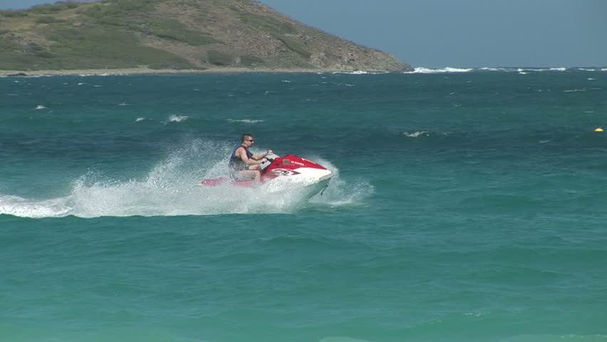 SINT MAARTEN - Circa 2008: Water scooter rider at Sint Maarten